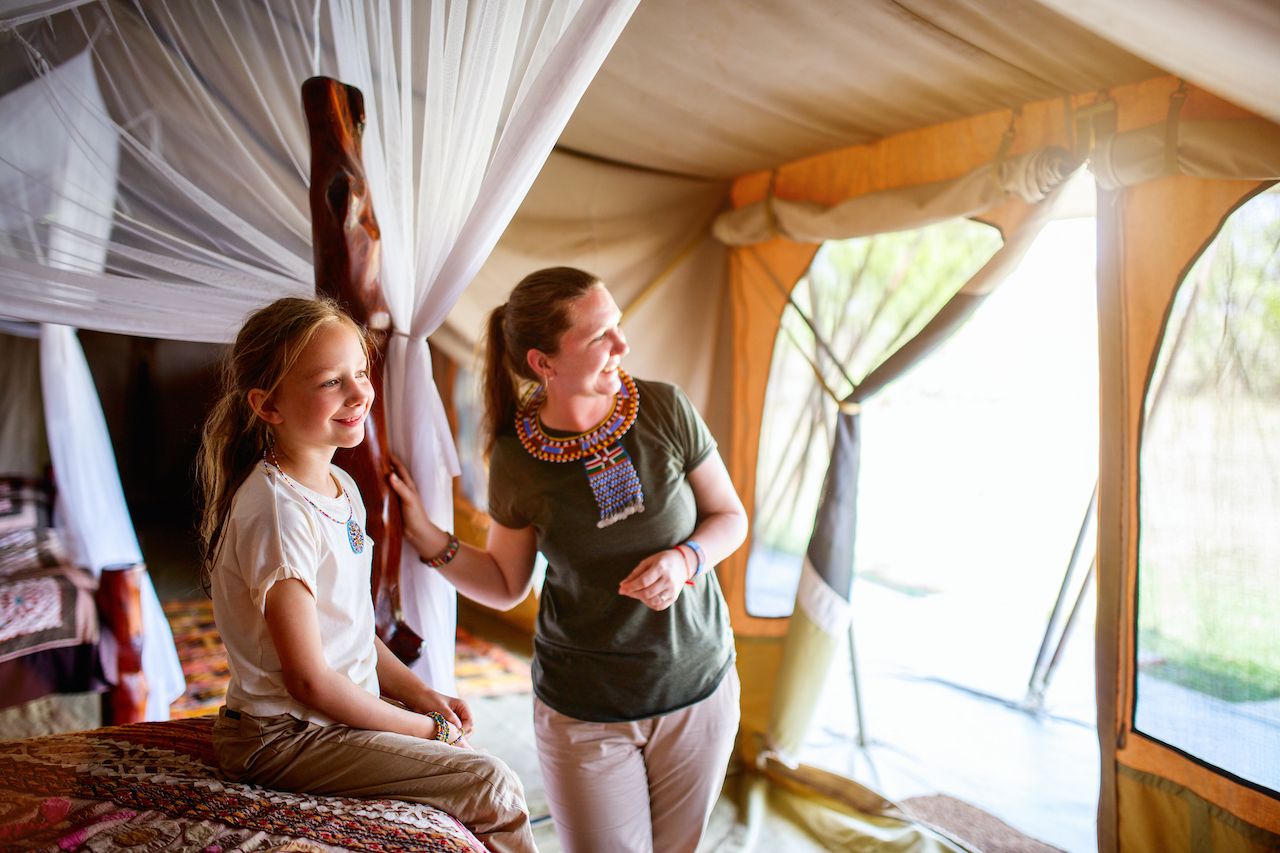 Family,Mother,And,Her,Child,In,Safari,Tent,Enjoying,Vacation