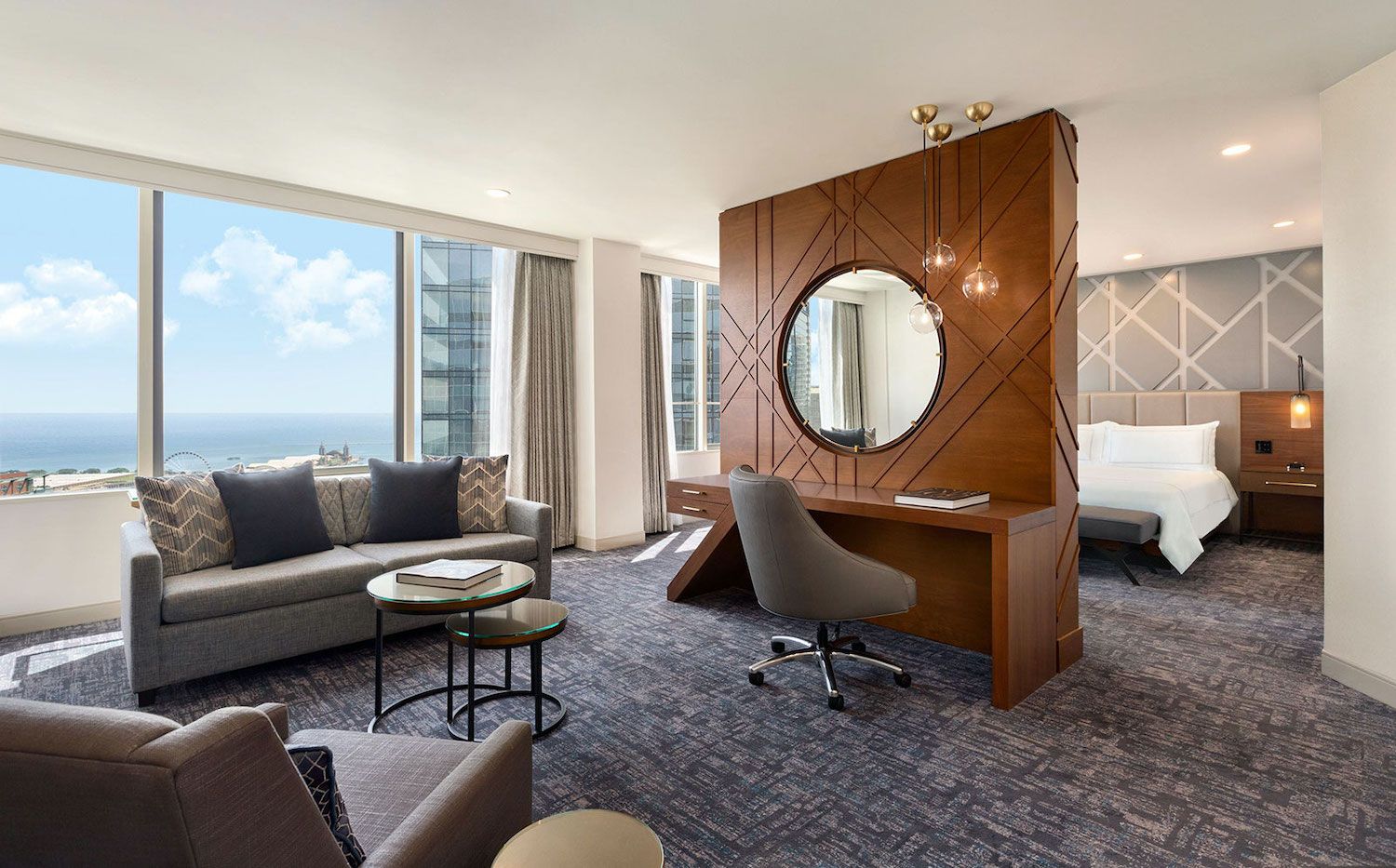Bright guest suite bedroom with Lake Michigan views at Swissotel Chicago