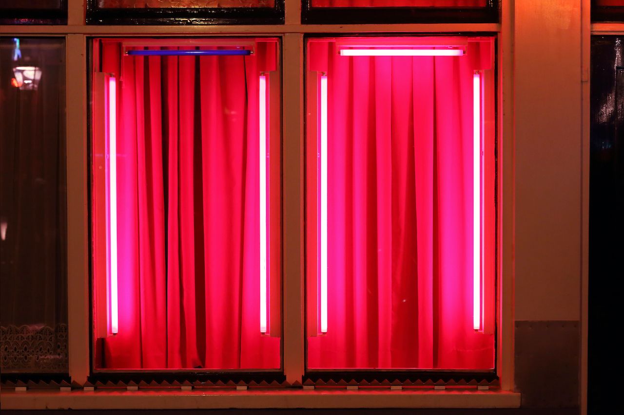 View of the window in red light district in Amsterdam Netherlands, Red Light District
