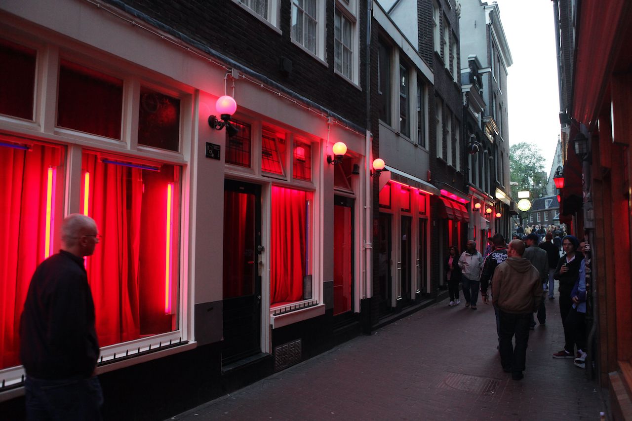 Red Lights District, at evening in Amsterdam, Holland (Netherlands).