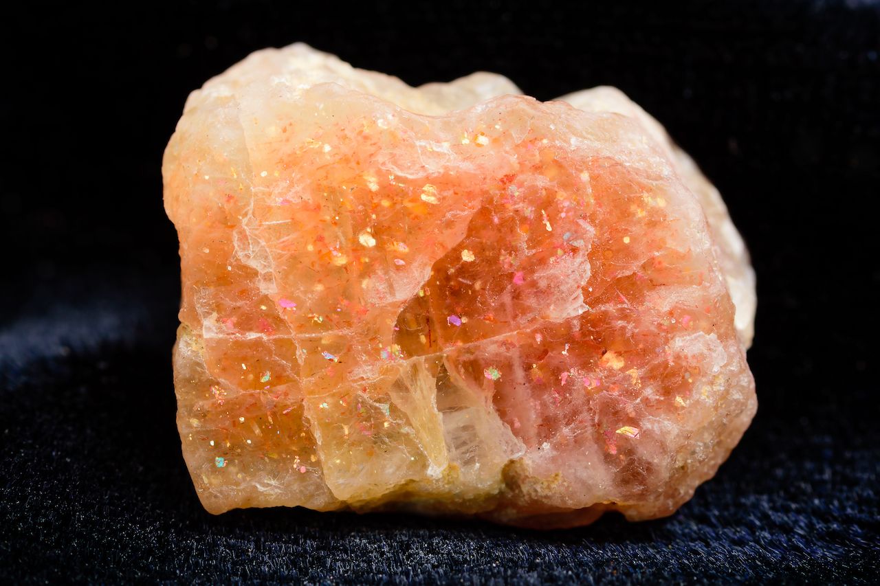 Uncut sunstone crystal with copper inclusions.