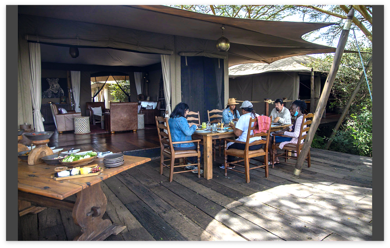Group has outdoor lunch at the Mara Nyika lodge