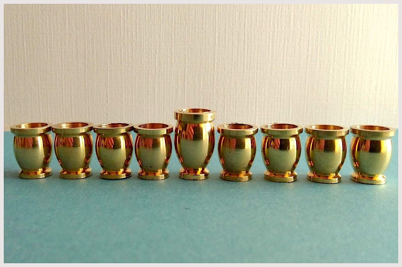Brass Hanukkah candle cups