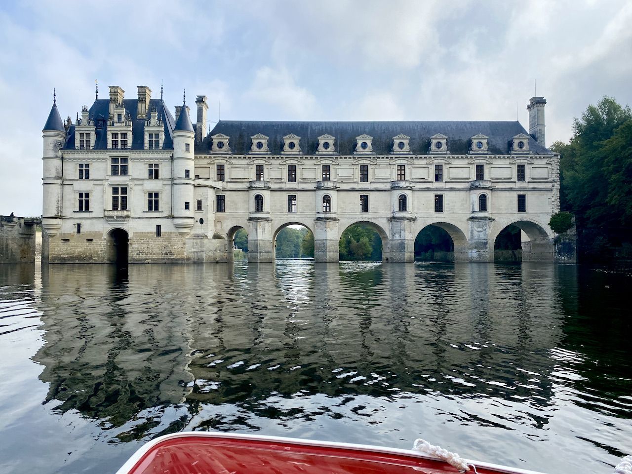 Looking back at Chateau Chenonceau from a boat
