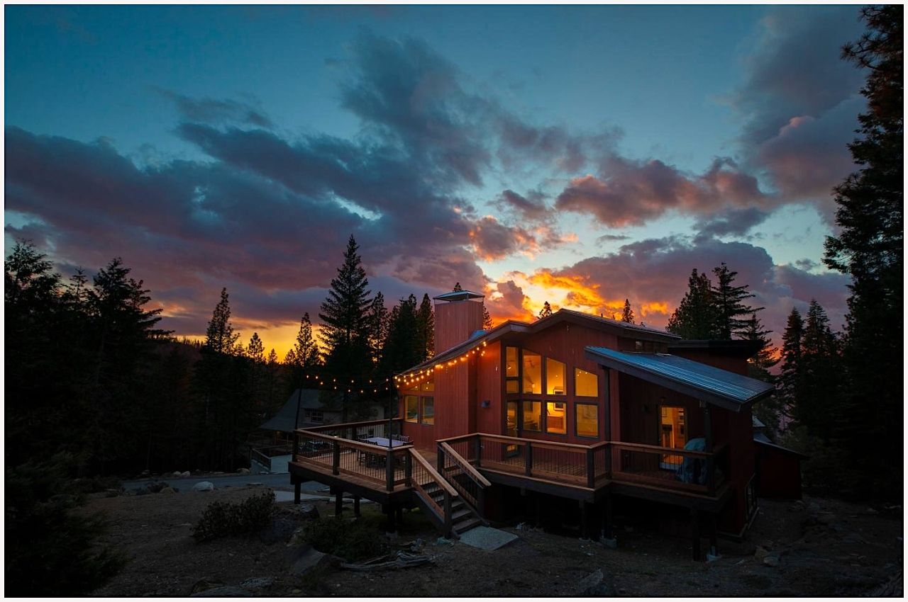A Yosemite cabin rental in the woods at sunset