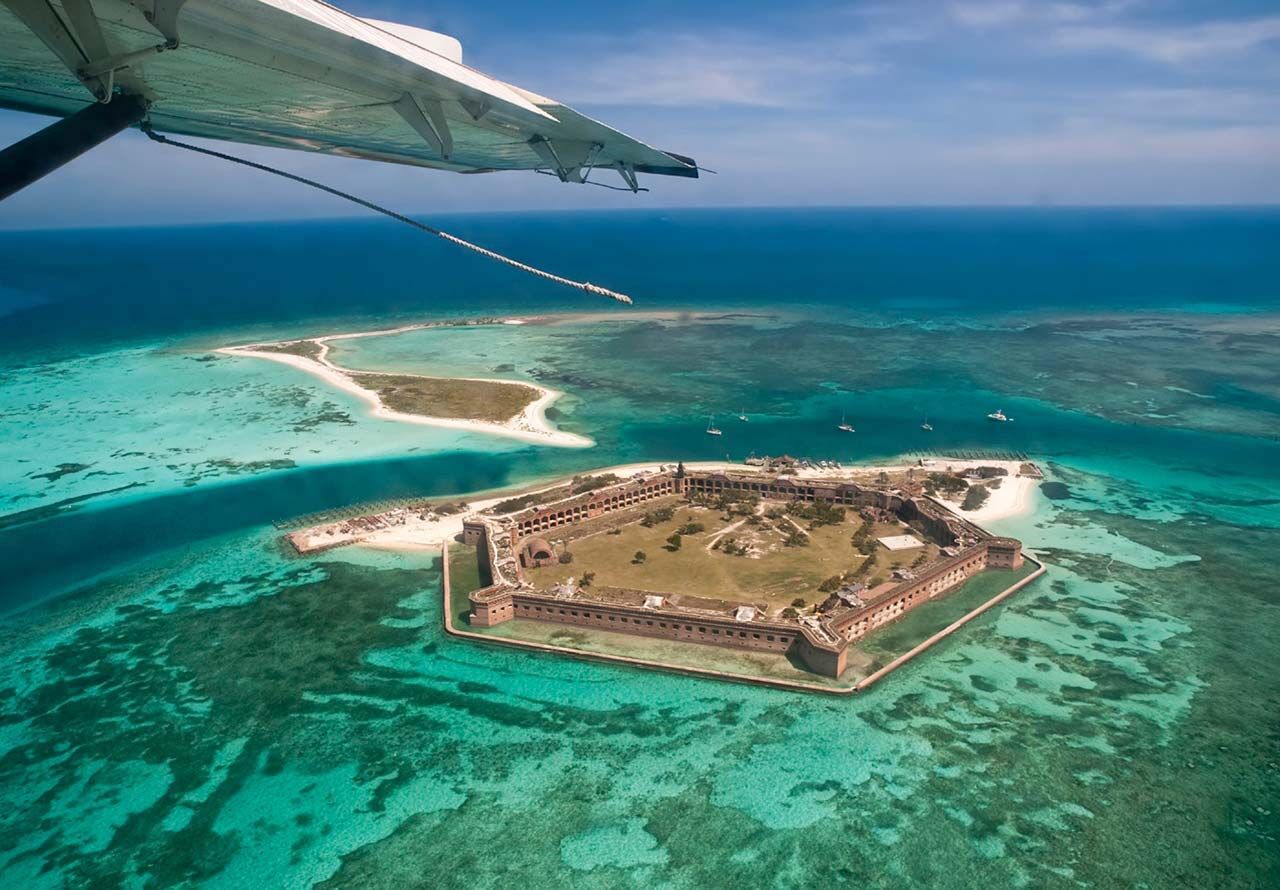 A seaplane flying over Dry Tortugas National Park