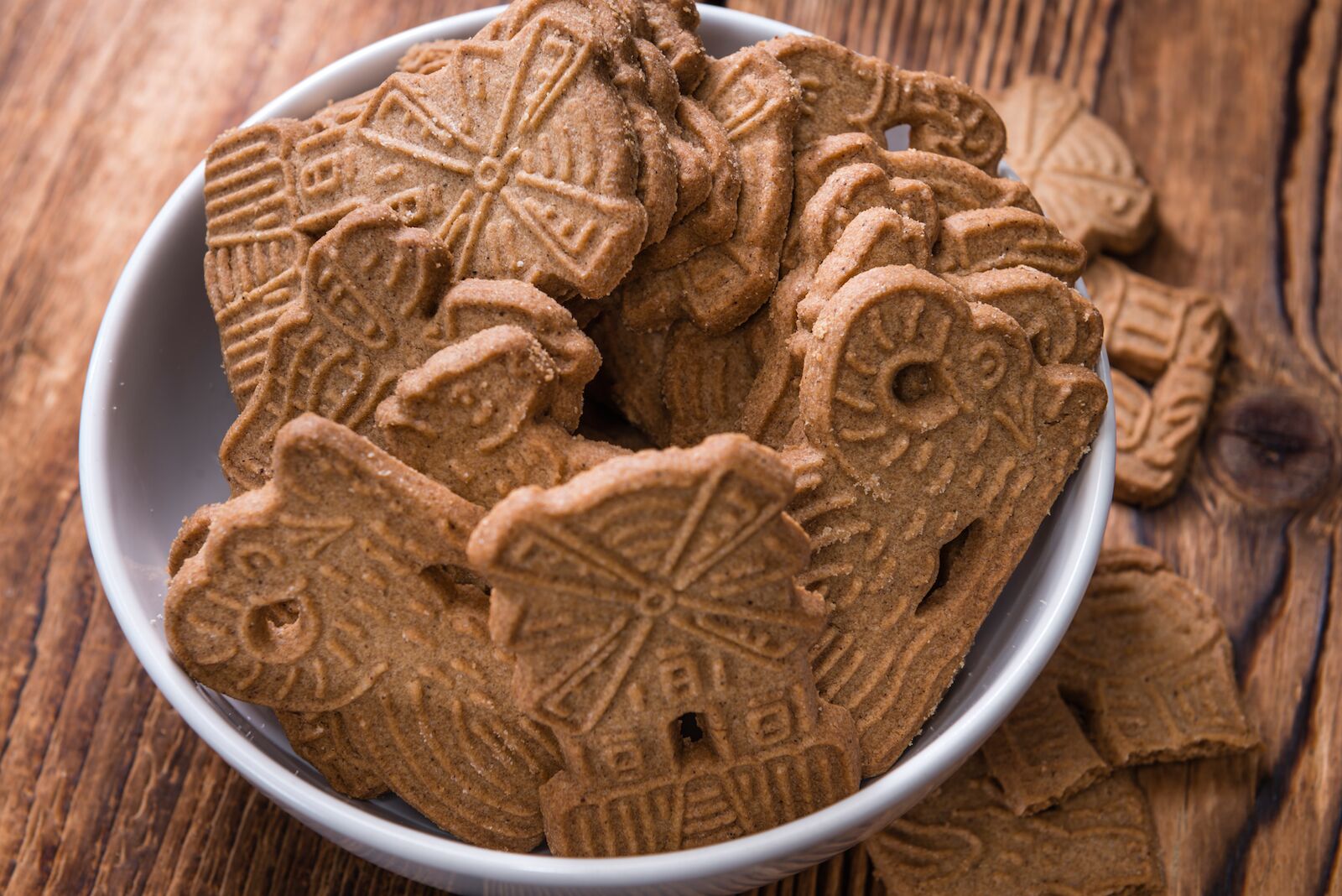 These spiced Spekulatius German Christmas cookies are in the shape of windmills