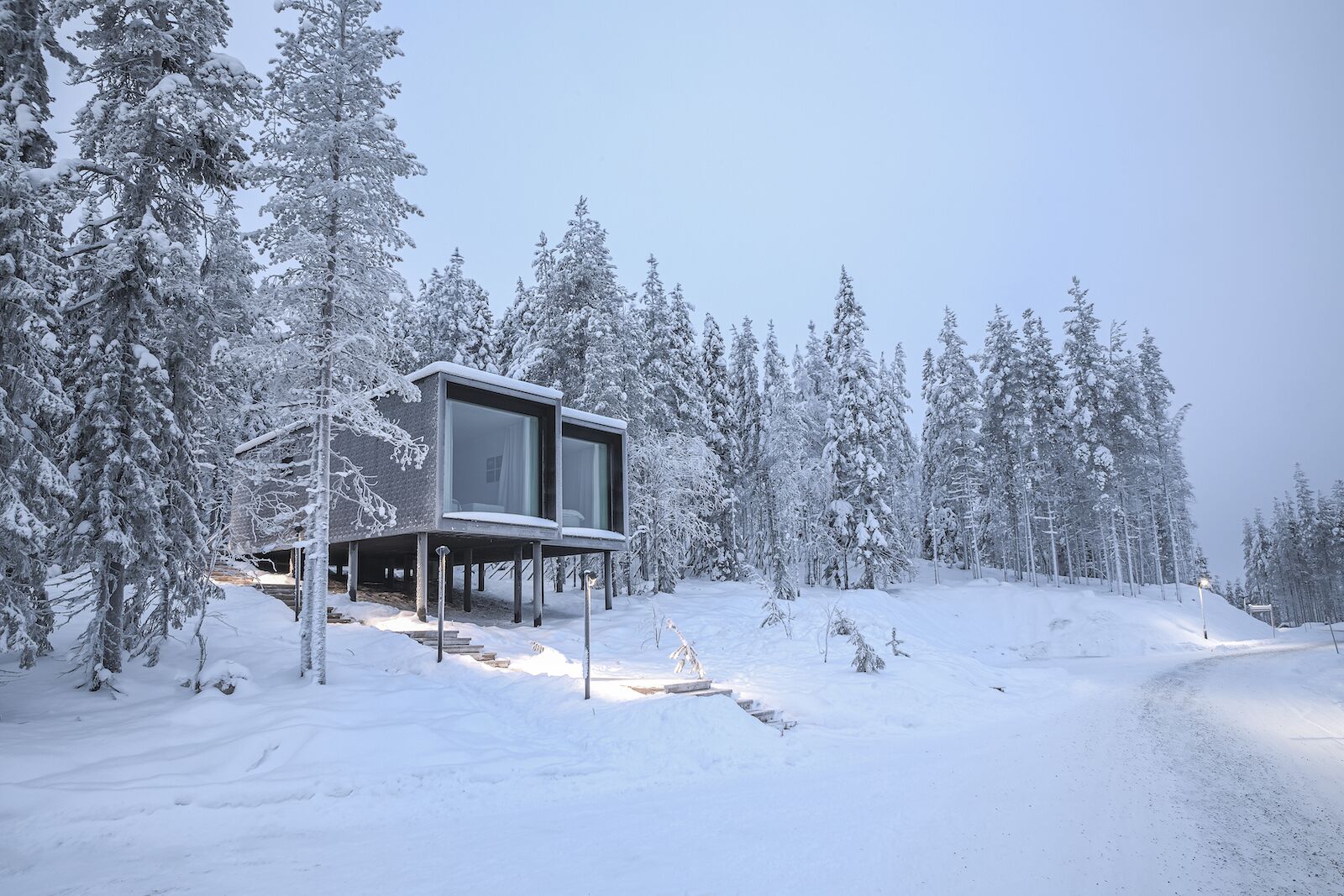 Arctic TreeHouse hotel buildings in the winter