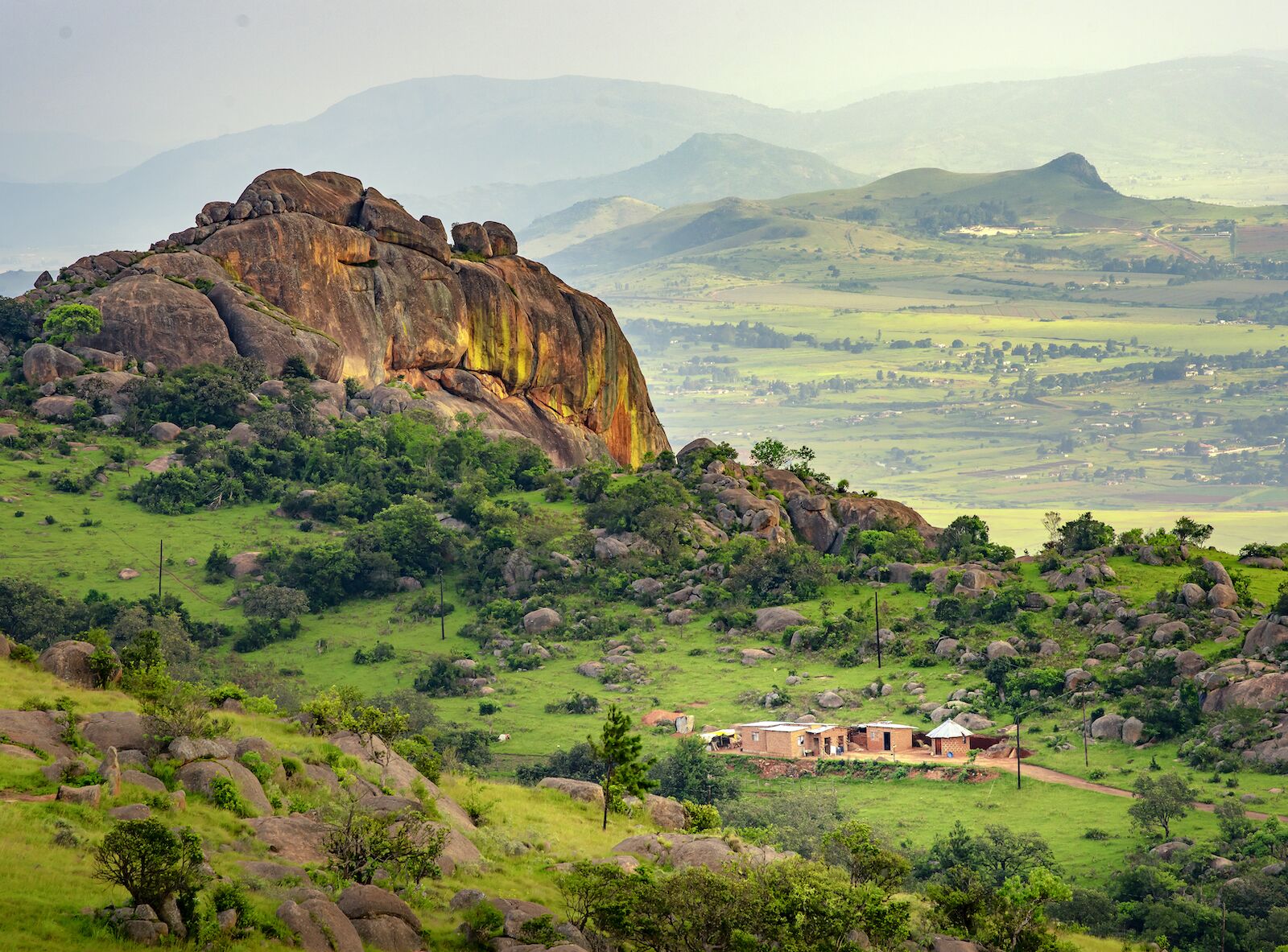 Ezulwini valley in Eswatini with beautiful mountains, trees and rocks in scenic green valley. Eswatini is one of the several countries that recently changed their names.
