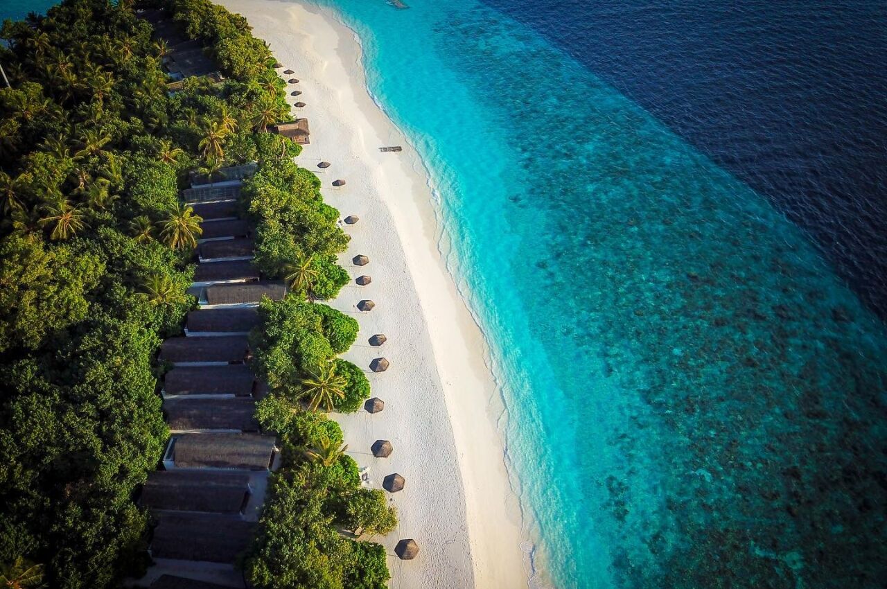 Aerial photo of Maldives beach huts at Reethi Beach Resort 