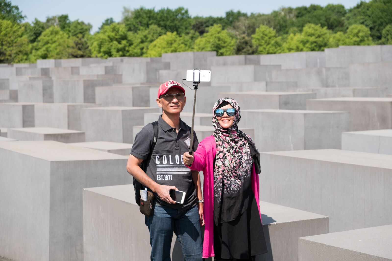Tourists taking a selfie at the Holocaust Memorial in Berlin, Germany