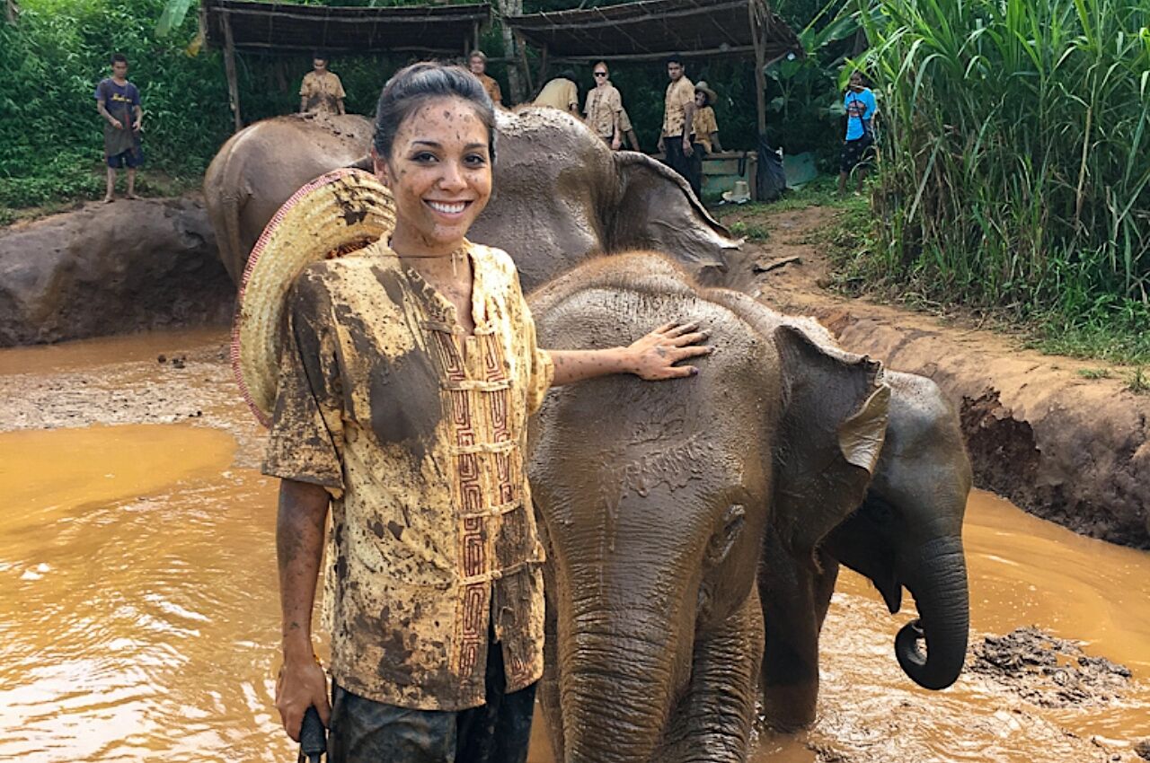 Julana Dizon with elephant in Thailand