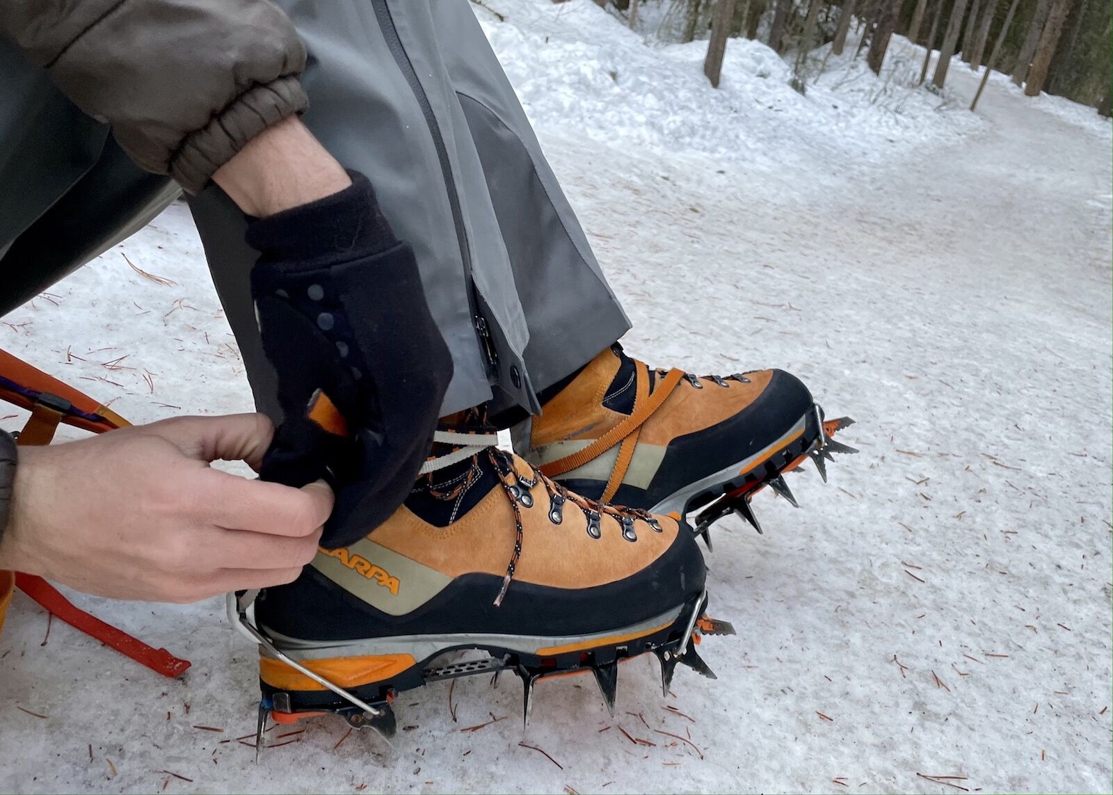 Ice climbing boots with crampons 