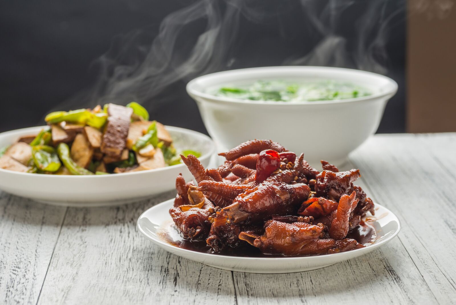 Braised chicken feet and green pepper fried with dried bean curd