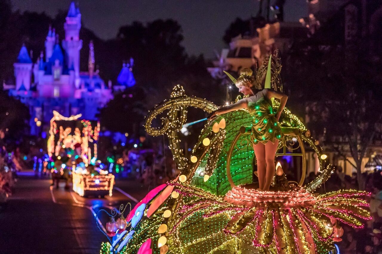 Parade of floats at night at Disney in California 