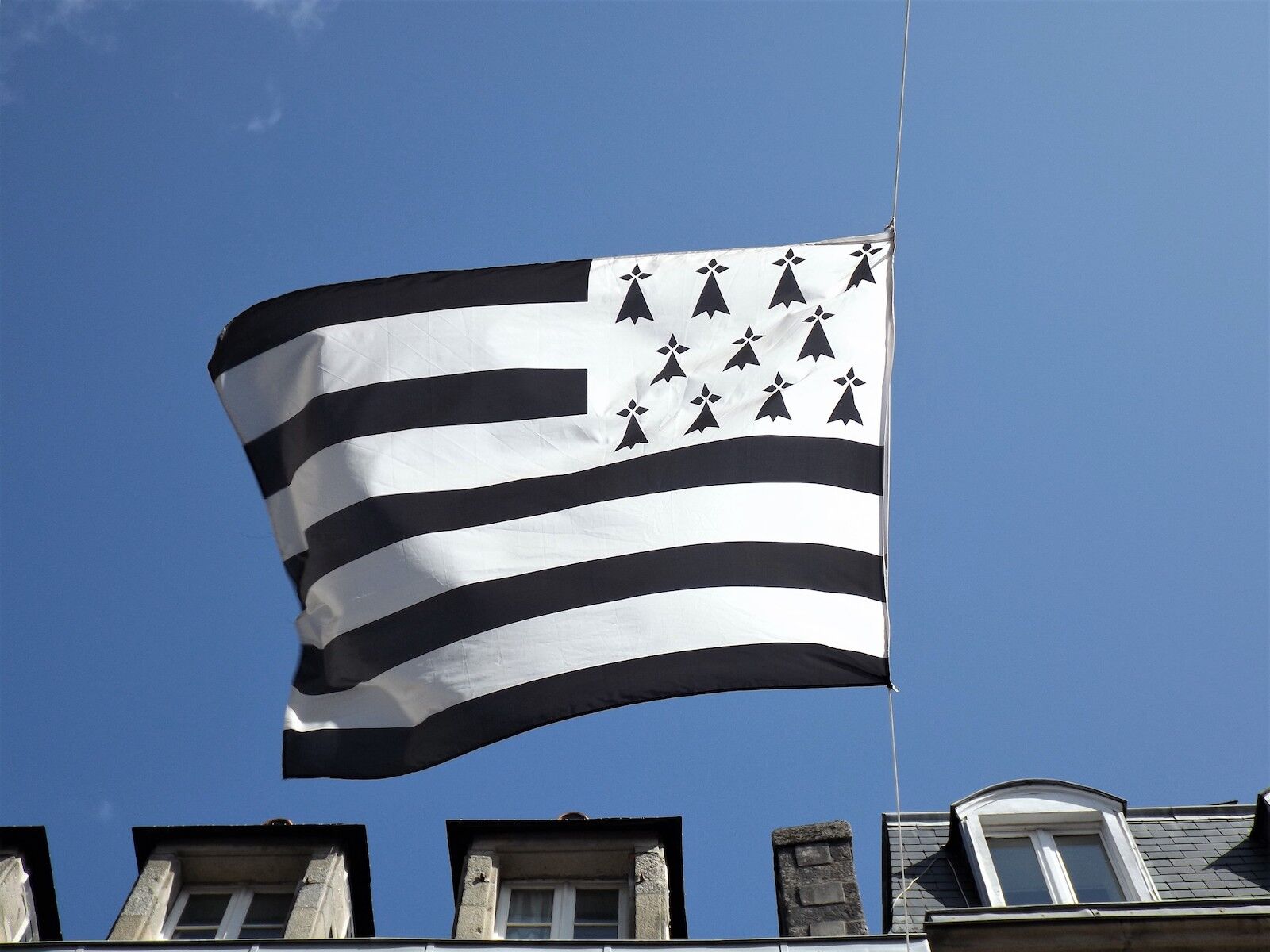 Celtic flags: Brittany. Brittany's flag is black and white with stripes