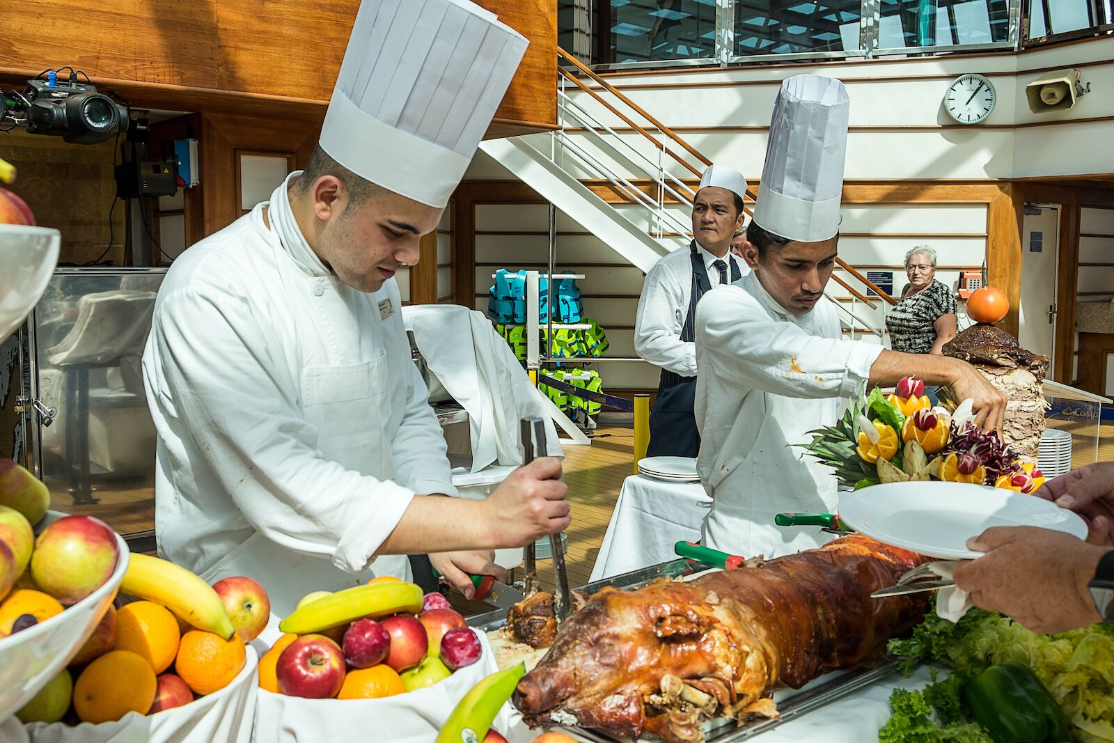 cruise ship chefs roasted pig