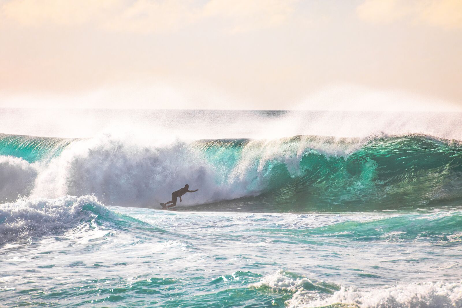 surfing hawaii's pipeline
