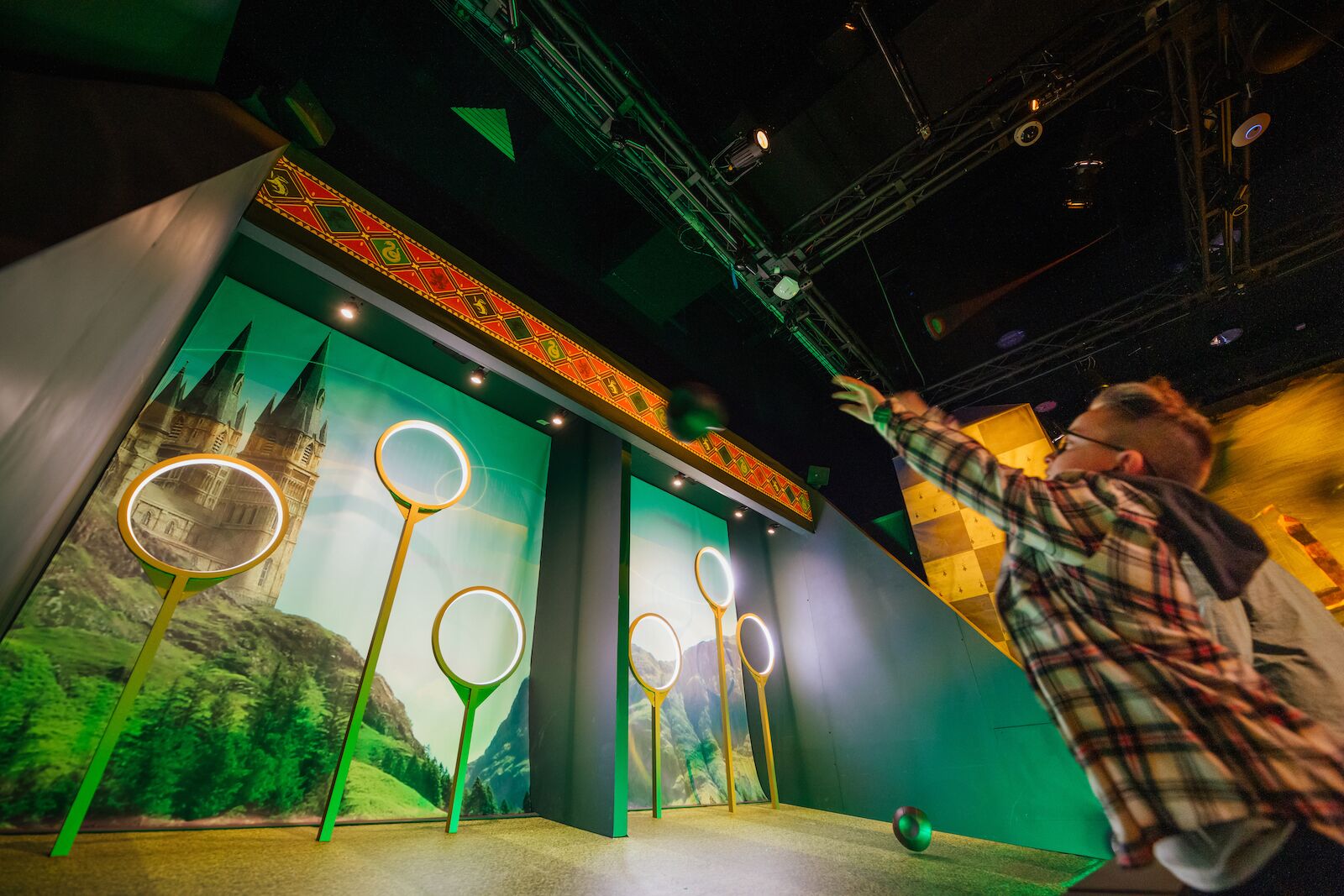 Kid playing Quidditch at Harry Potter: The Exhibition in Philadelphia