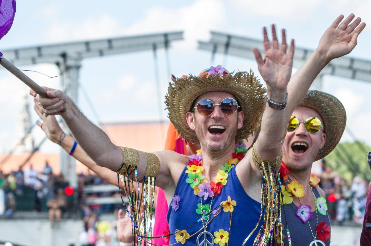 Friends in gay Amsterdam in Pride