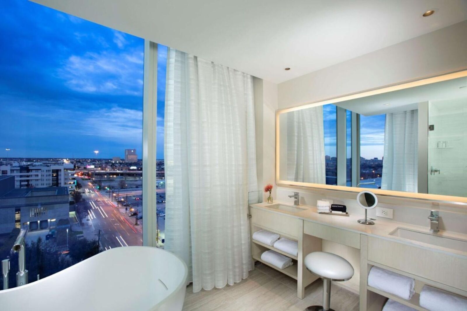 Bathtub with view at HALL Arts Hotel, Dallas, Texas one of the best hotels with big bathtubs in the US