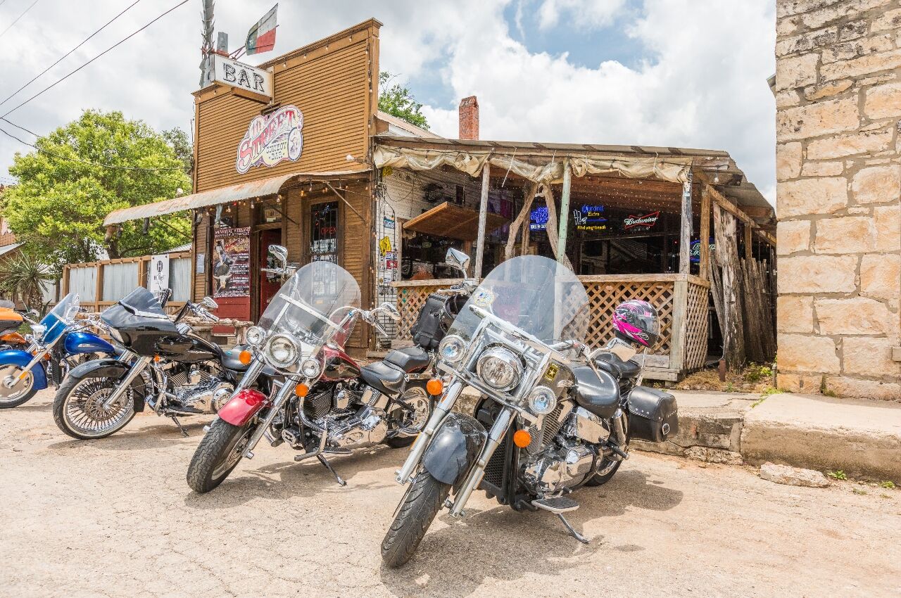 Bikes in front of bar in Bandera a small town in Texas