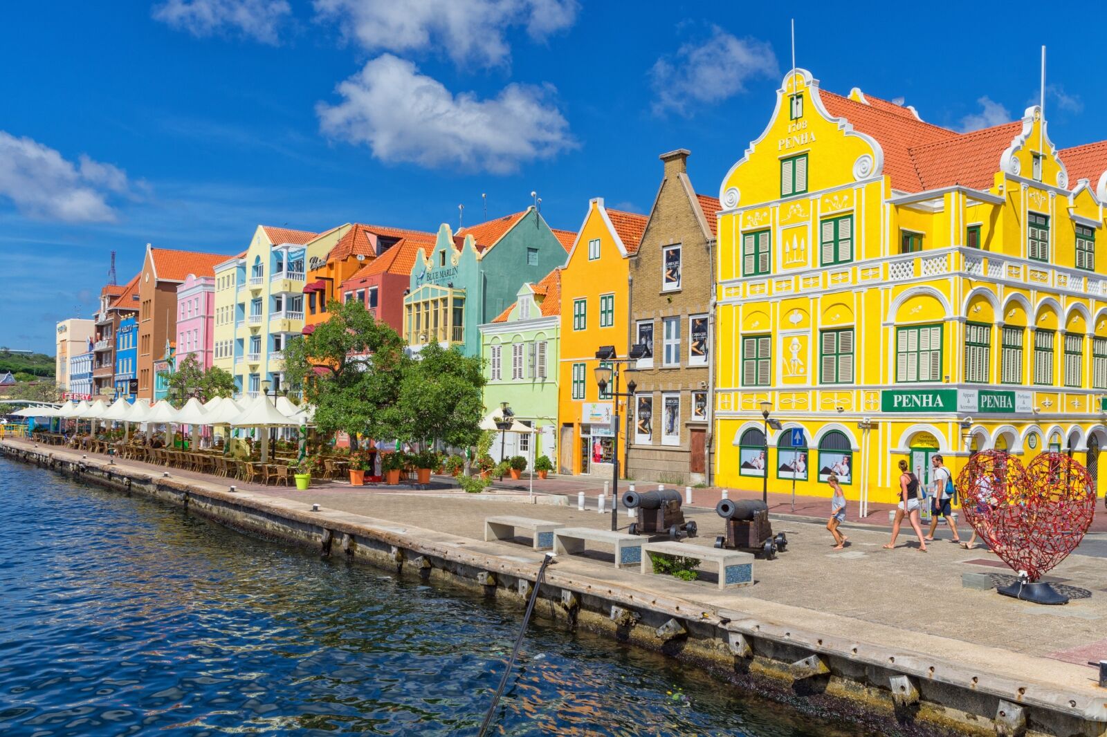 Heart with locks near emma bridge on Curacao. Near the historical buildings of Curacao