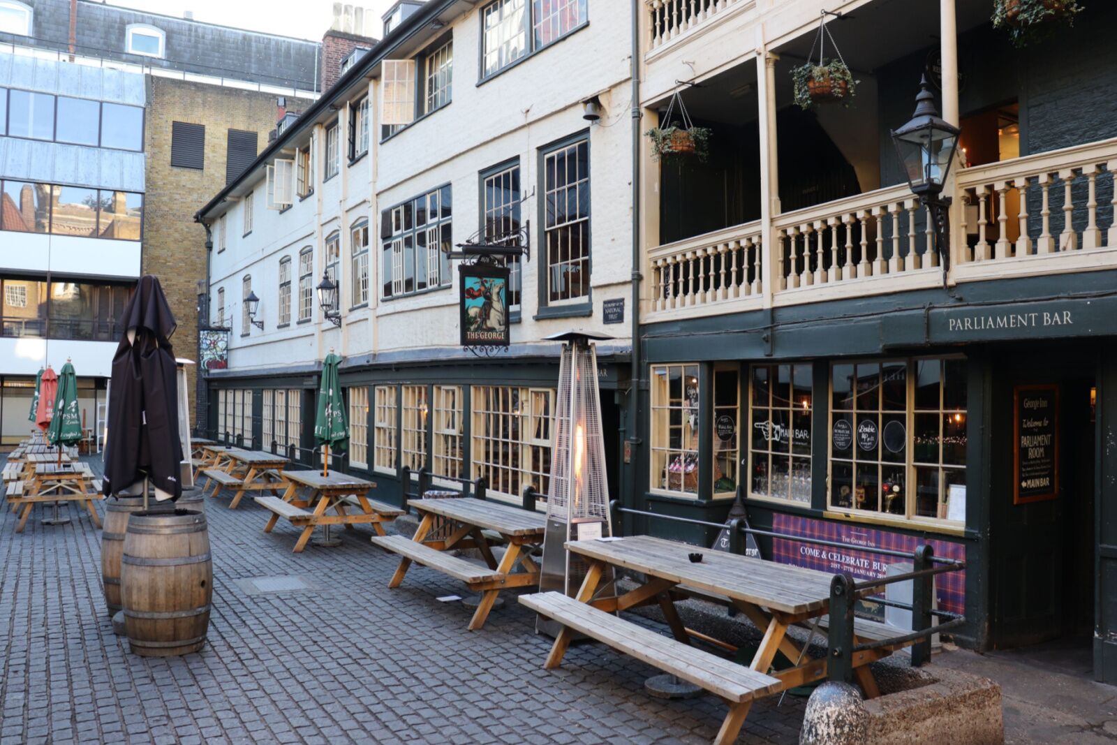 George Inn London with benches in the front
