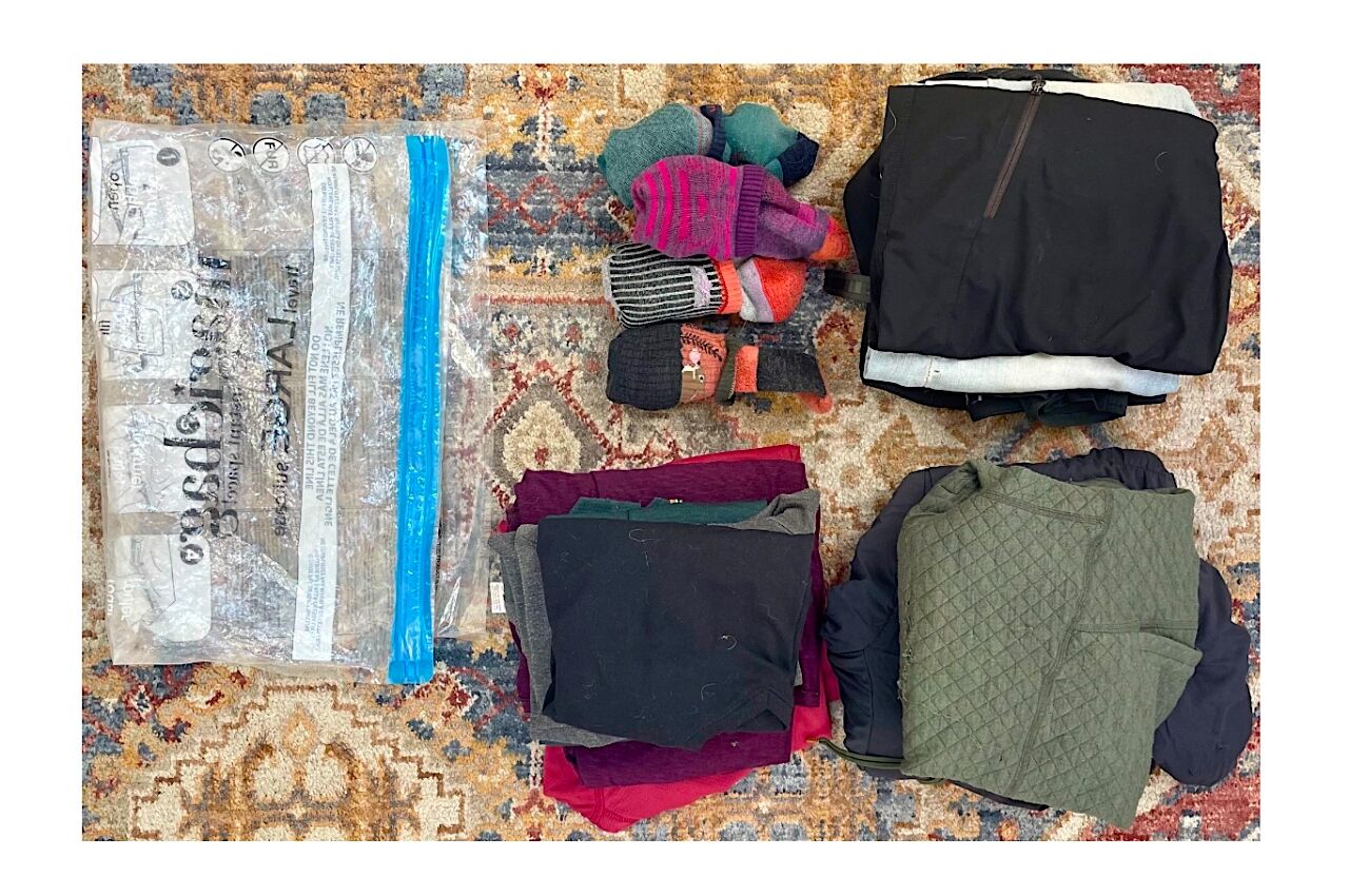 Clothing on floor for carry on packing tips