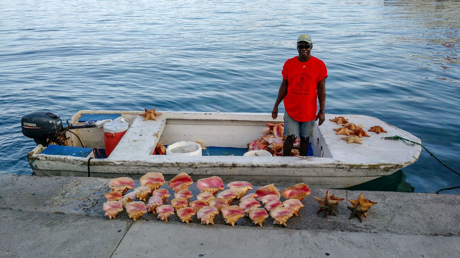 conch-dishes-conch-fisherman-with-shells