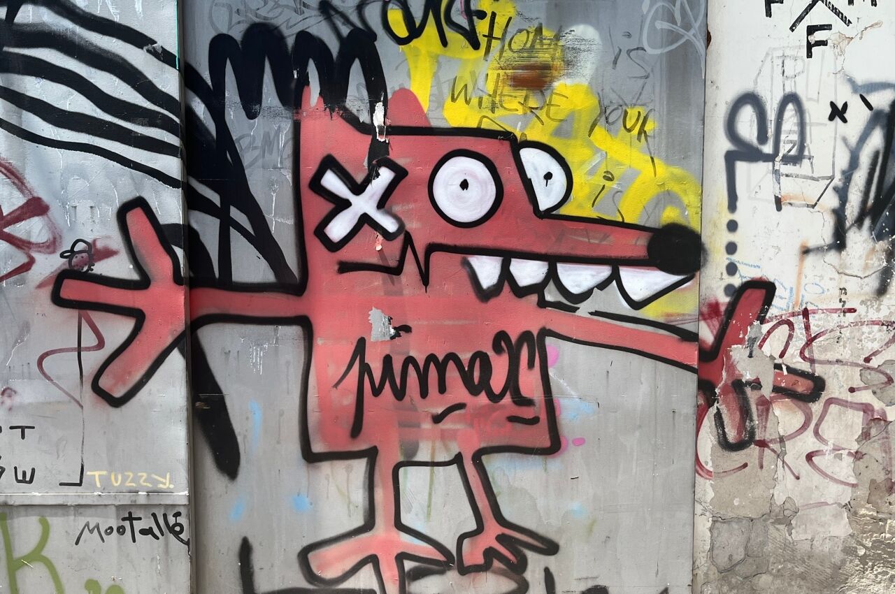 Street art of pink dog in gay Tel Aviv