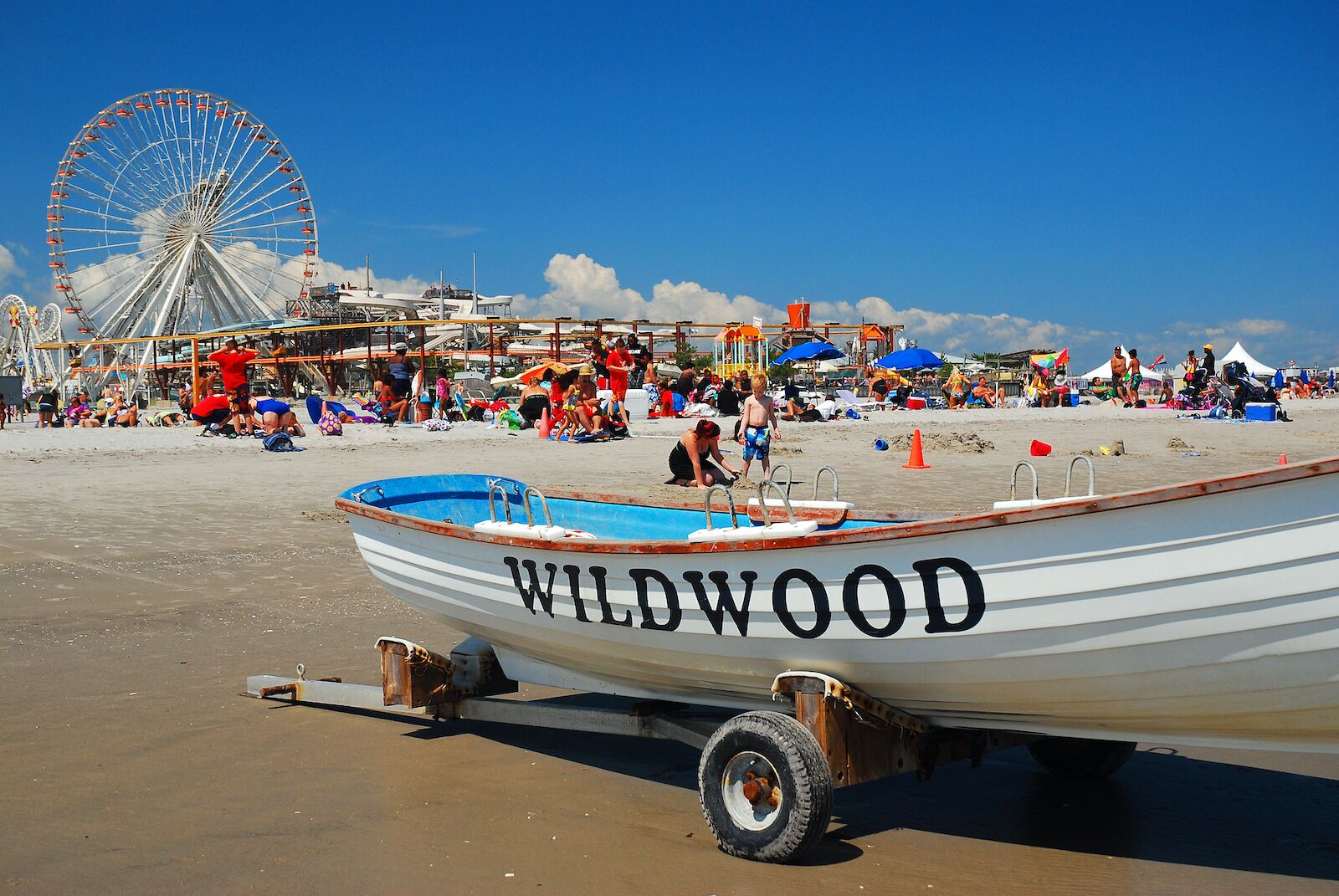 jersey shore beaches crowded wildwood beach with ferris wheel in the background