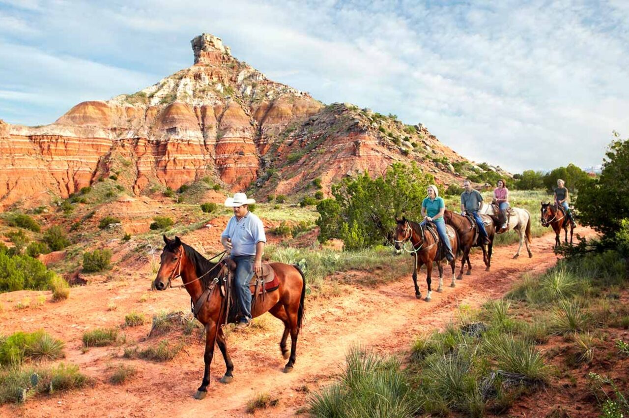 People on horses at Palo Duro Texas state park