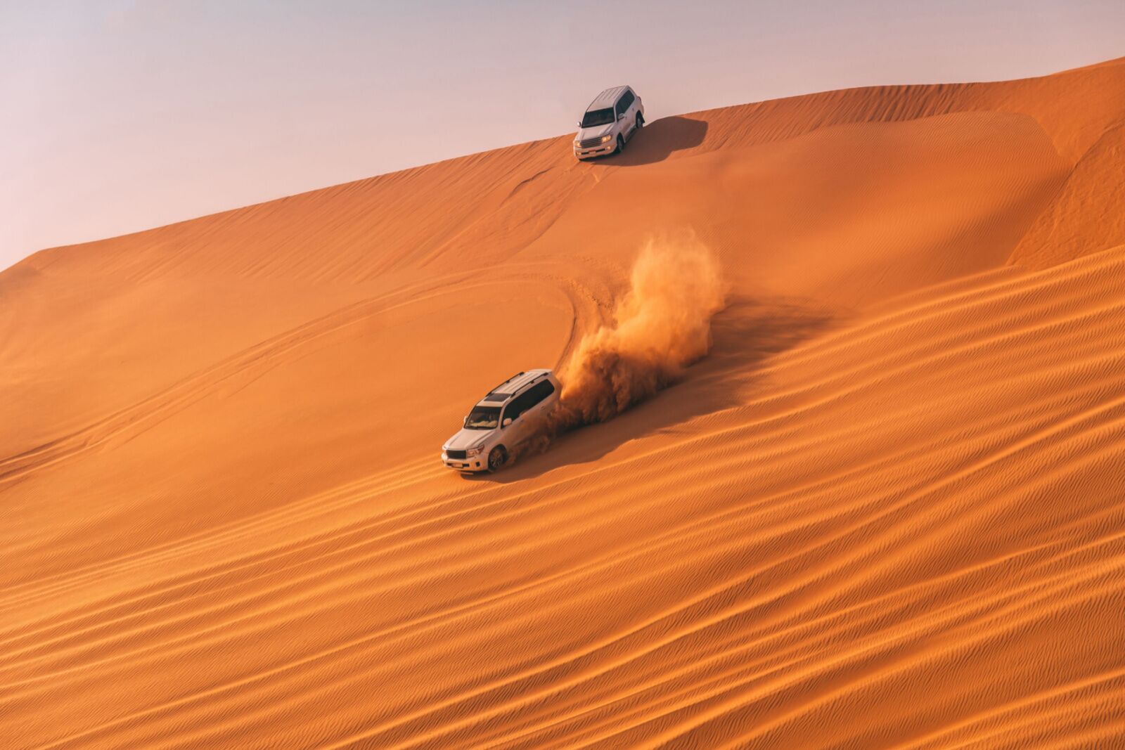 Trucks swerving through the desert
