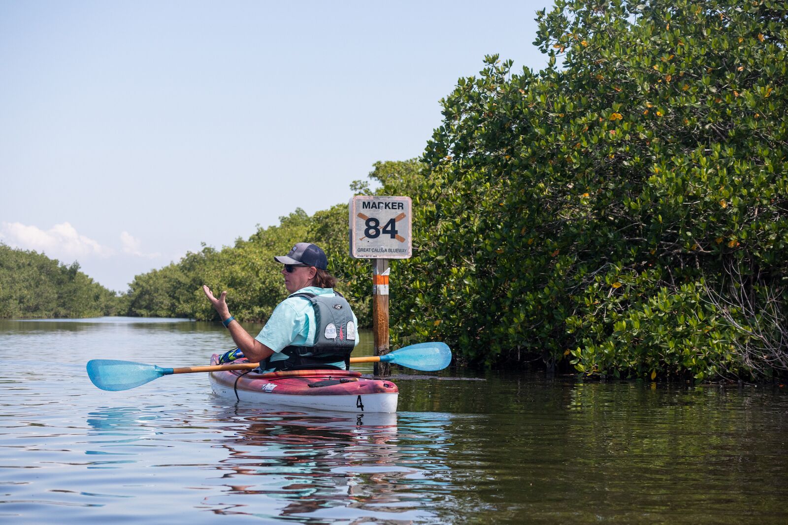 A kayak guide paddling through the mangroves at Matlacha