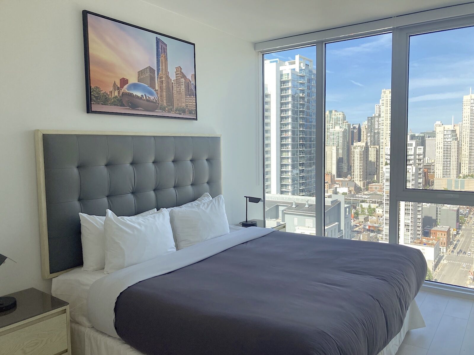 bedroom with skyline view at level chicago river north
