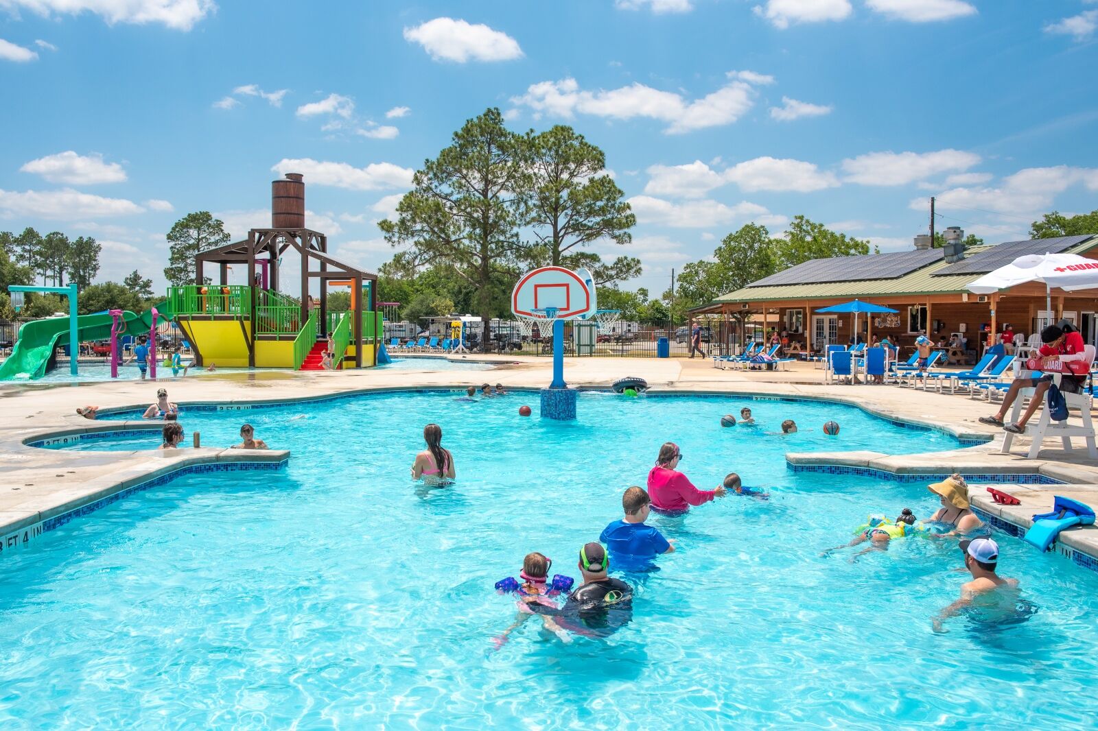 People in swimming pool at Jellystone park best camping in Houston 