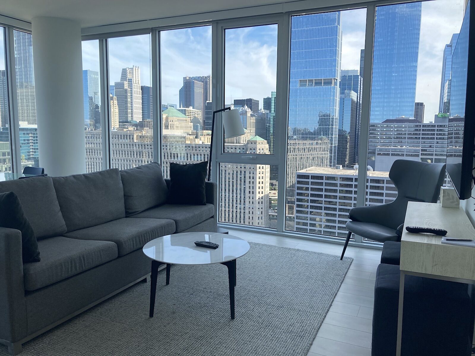 living room with skyline view at level chicago river north