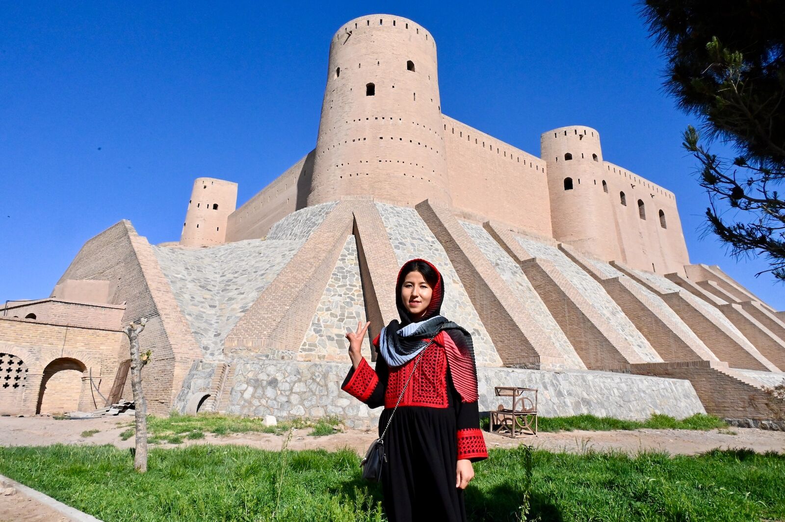 Fatima Haidari, Afghanistan’s first female tour guide poses at an historical site