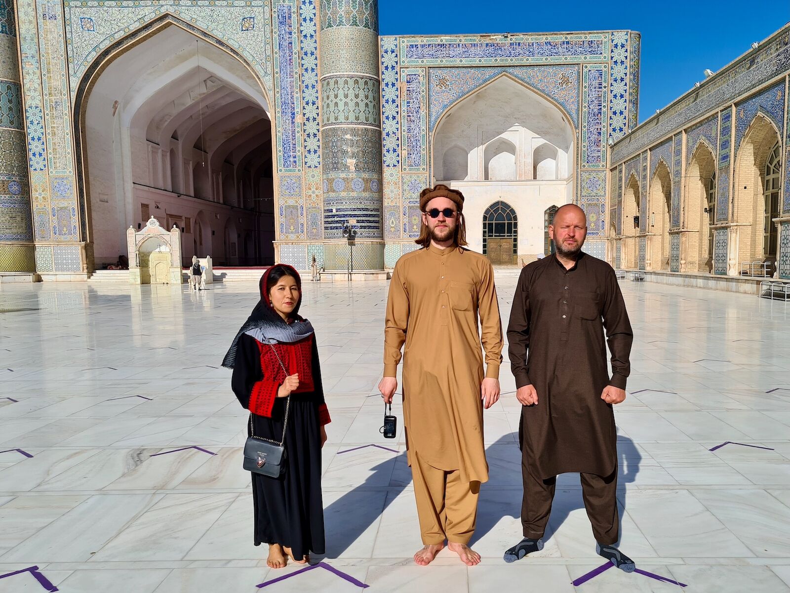 Fatima Haidari, Afghanistan’s first female tour guide poses with a visitors at an historical site