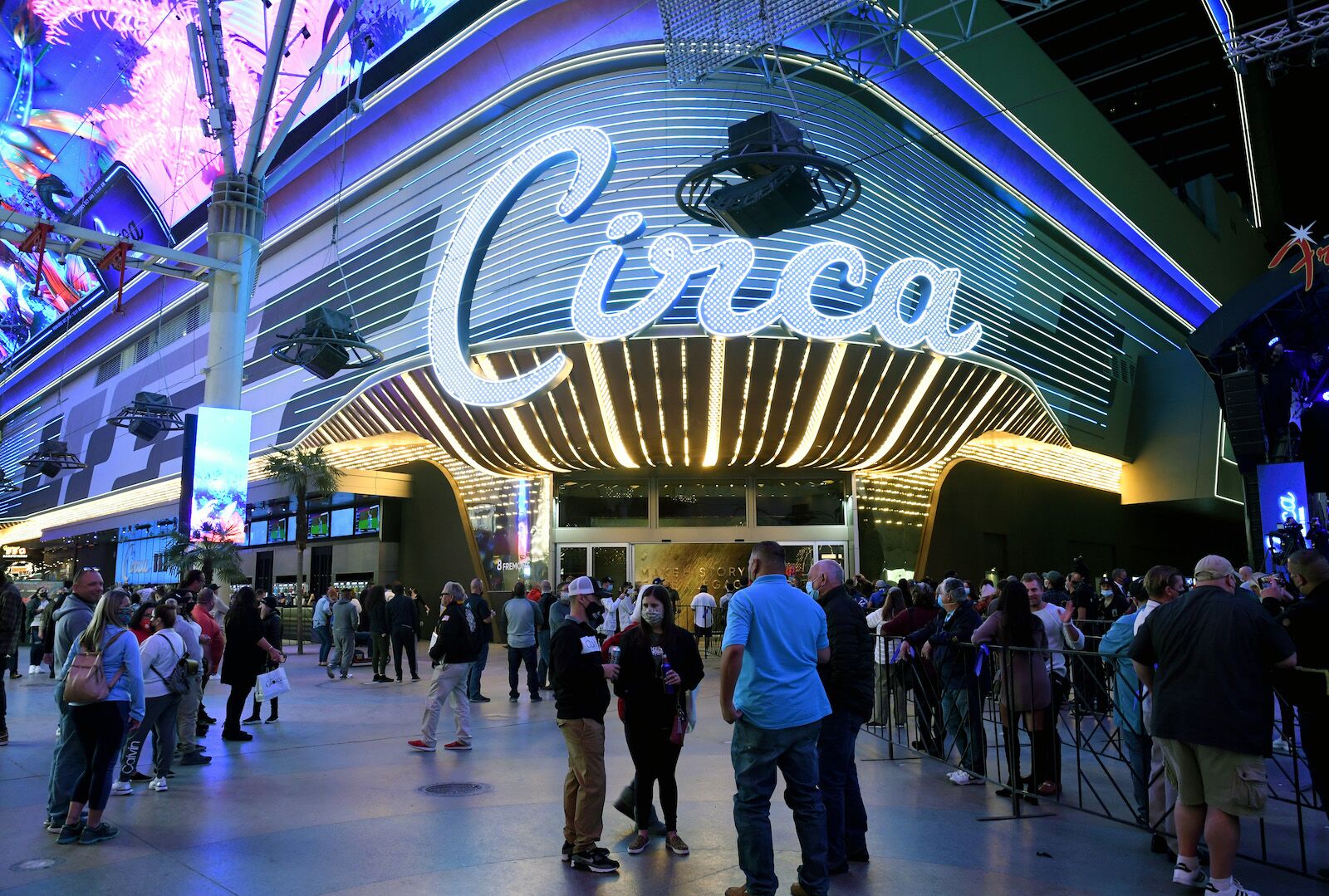 LAS VEGAS, NEVADA - OCTOBER 27: Guests stand in line at the Fremont Street Experience as they wait to enter Circa Resort & Casino during the property's grand opening on October 27, 2020 in Las Vegas, Nevada. (Photo by Ethan Miller/Getty Images for Circa Resort & Casino)