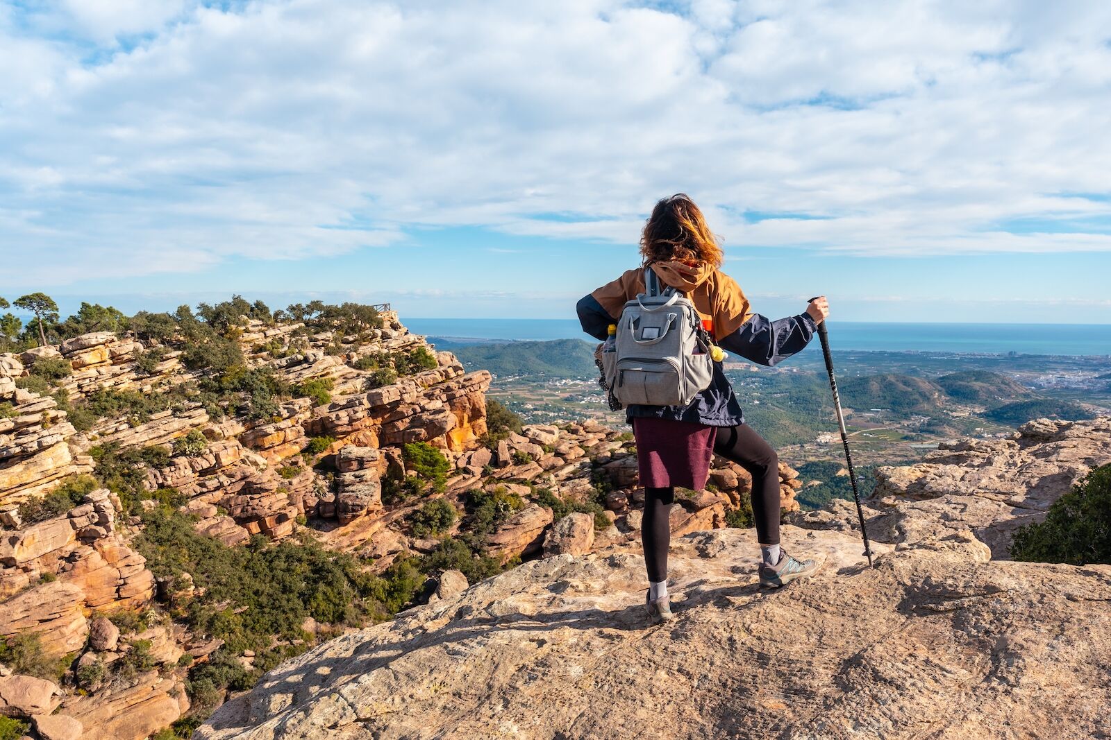 Person hiking in Valencia, a region of Spain where people speak the Catalan language