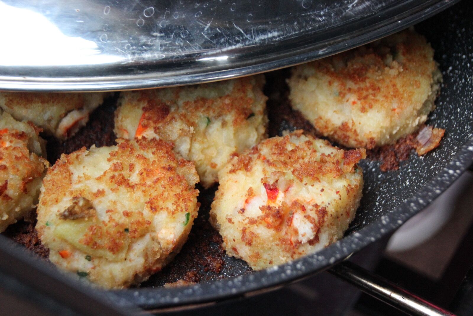 lobster cakes cooking - savour the sea caves