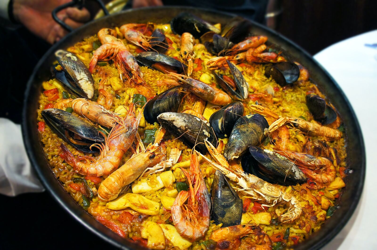 paella is a common Valencia food with mussels rice and shrimp