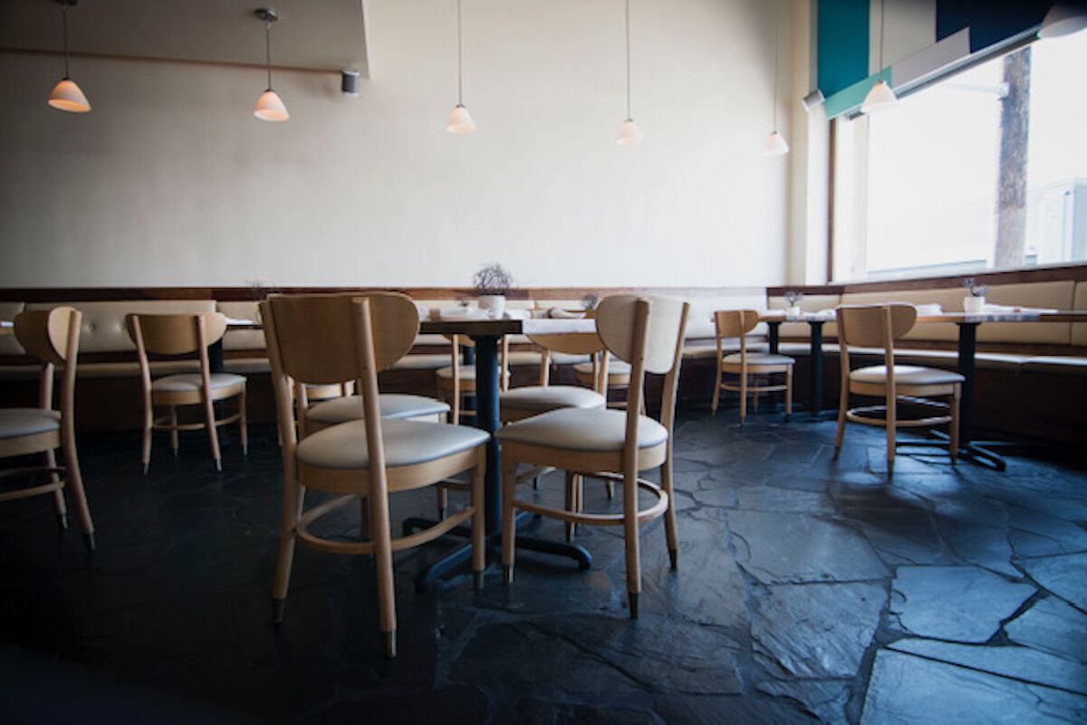 empty interior dining room at Kali - cheapest michelin star restaurants in California