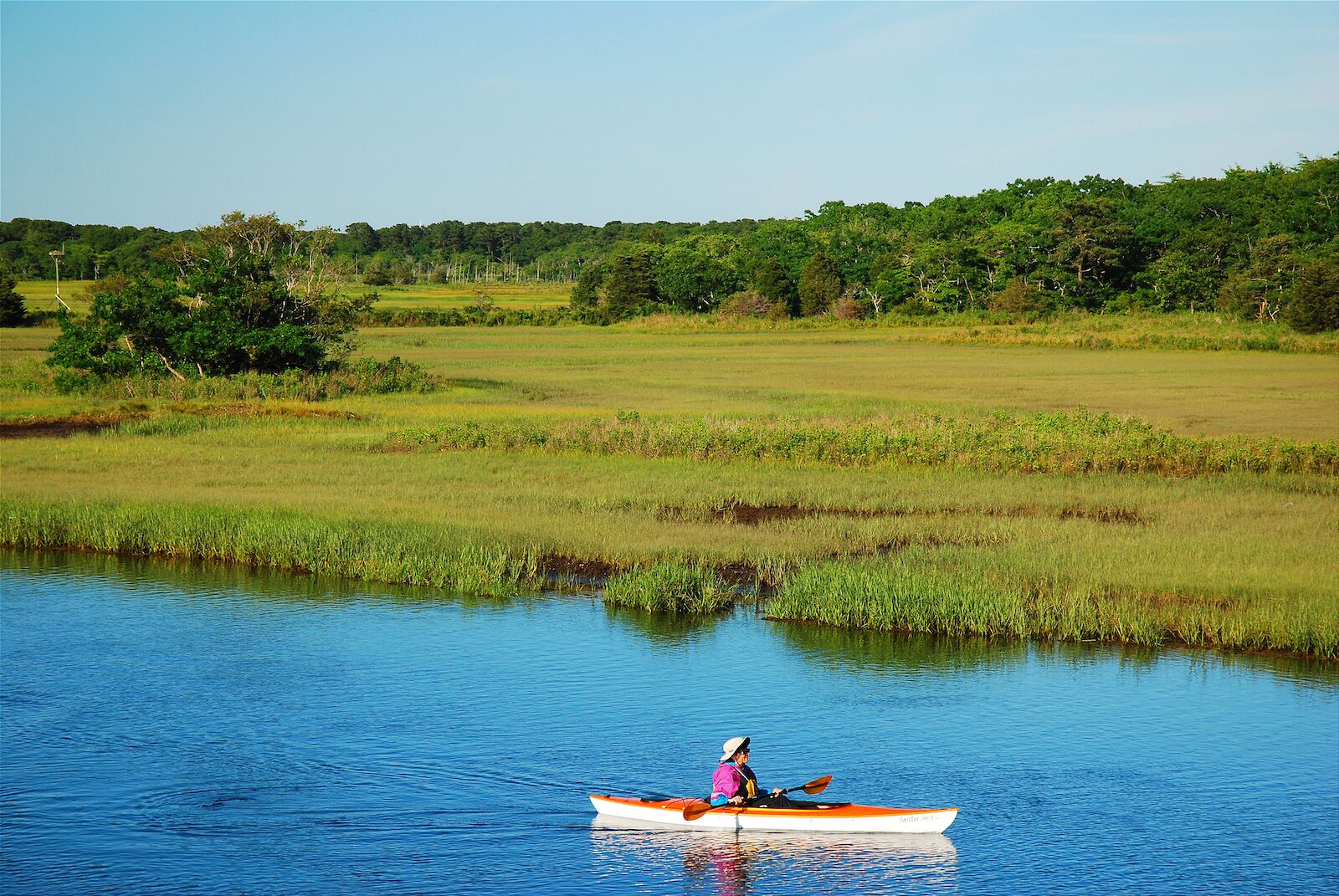 Person kayaking in Brewster, a Cape Cod town