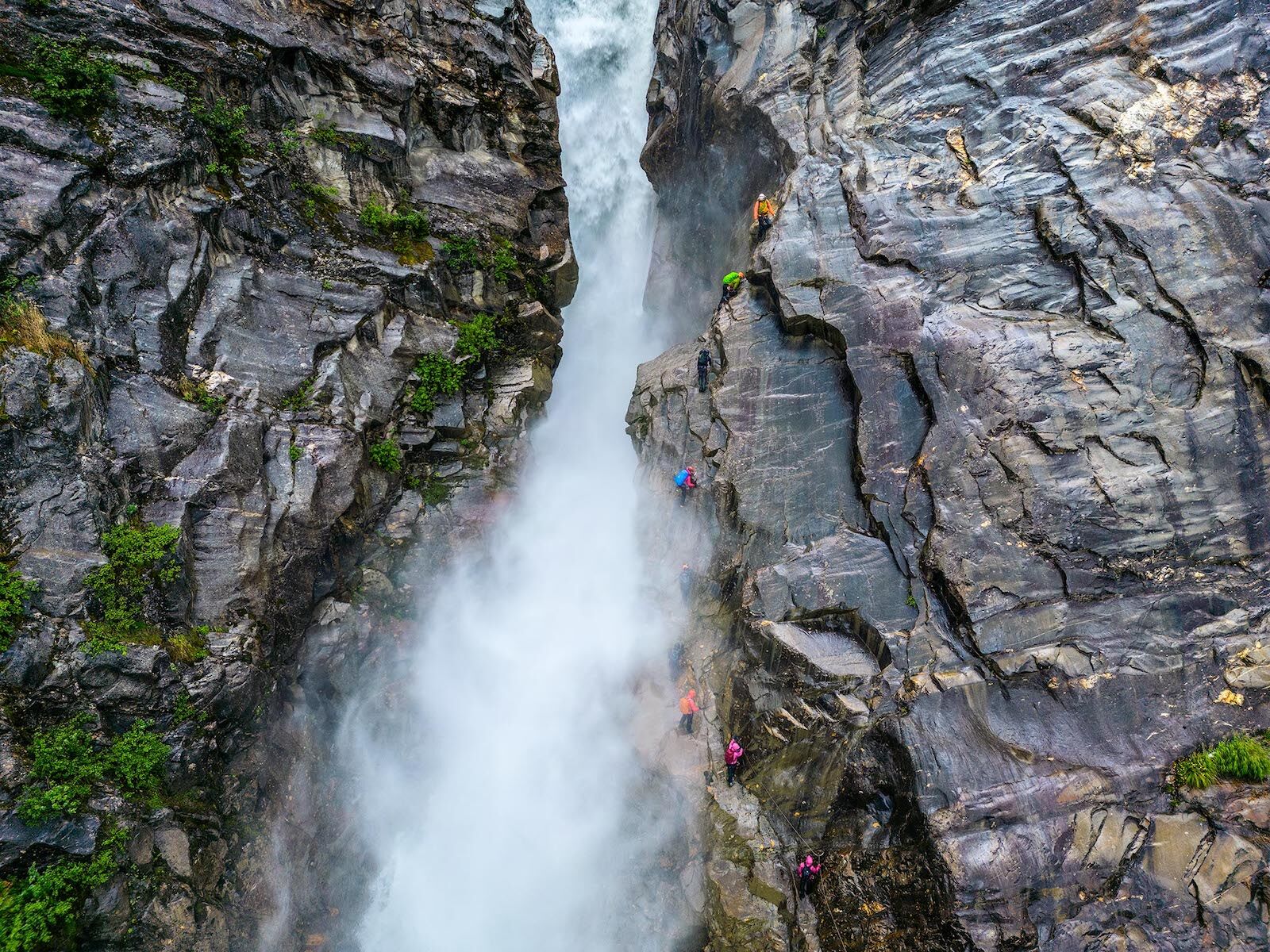 climbing up waterfall cariboos british columbia