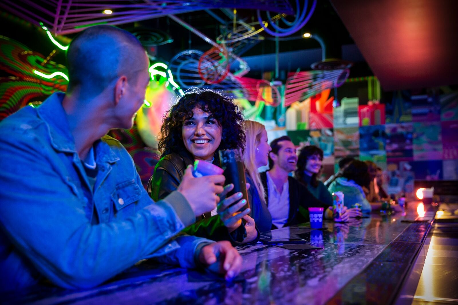 Guests sit at bar Datamosh a Las Vegas speakeasy