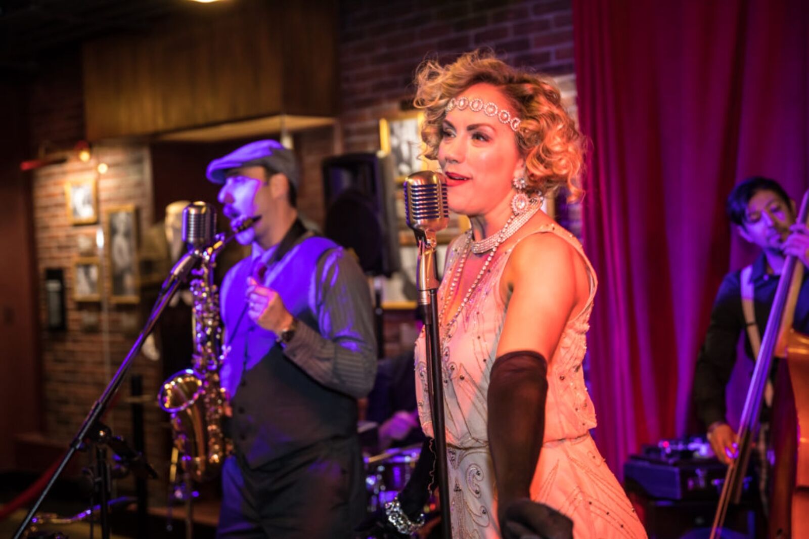 Woman sings with live band in Las Vegas speakeasy The Underground