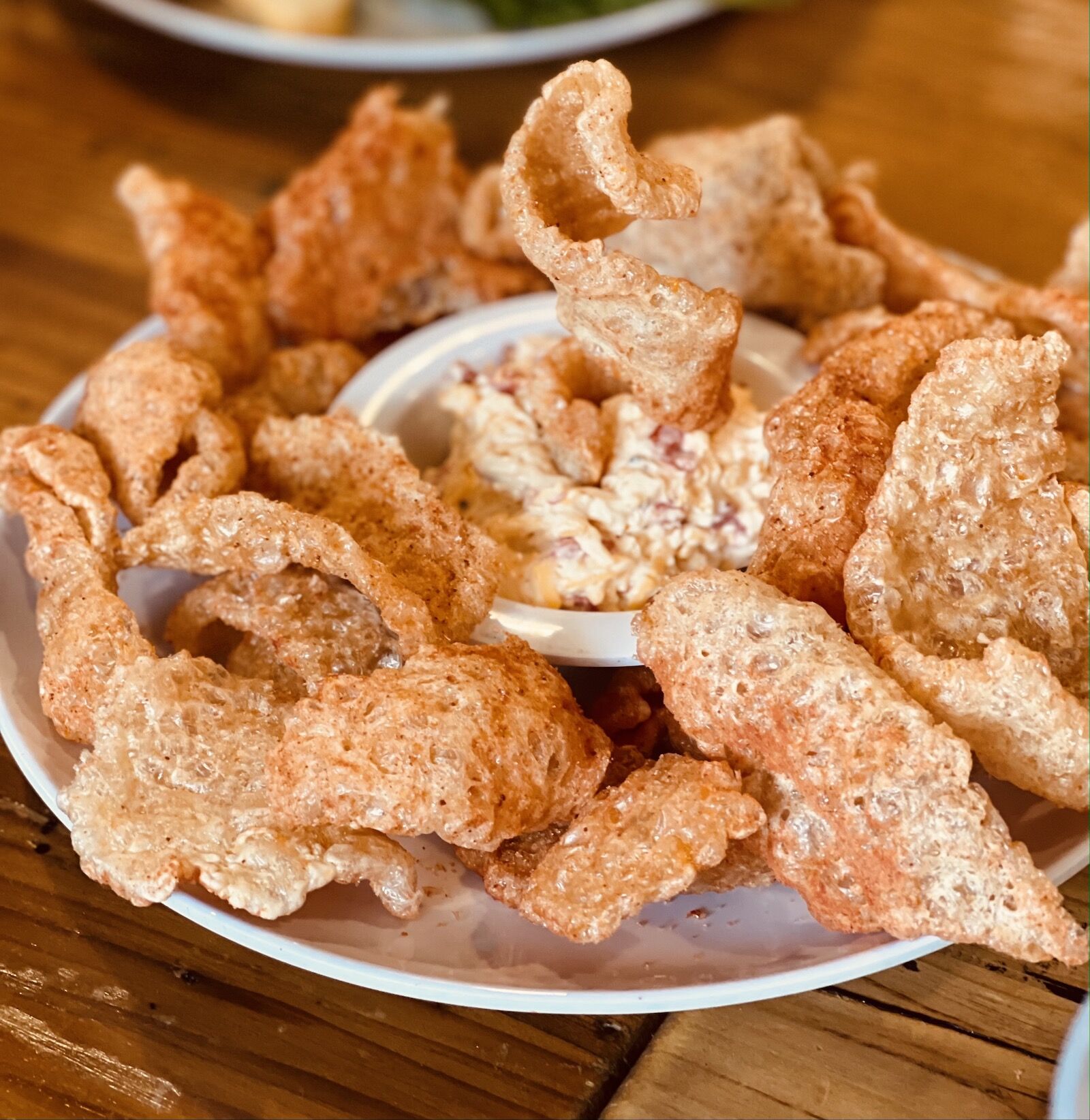 white bowl filled with pork rinds - dollywood food
